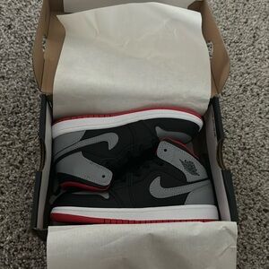 NWT and BOX Jordan 1 mid